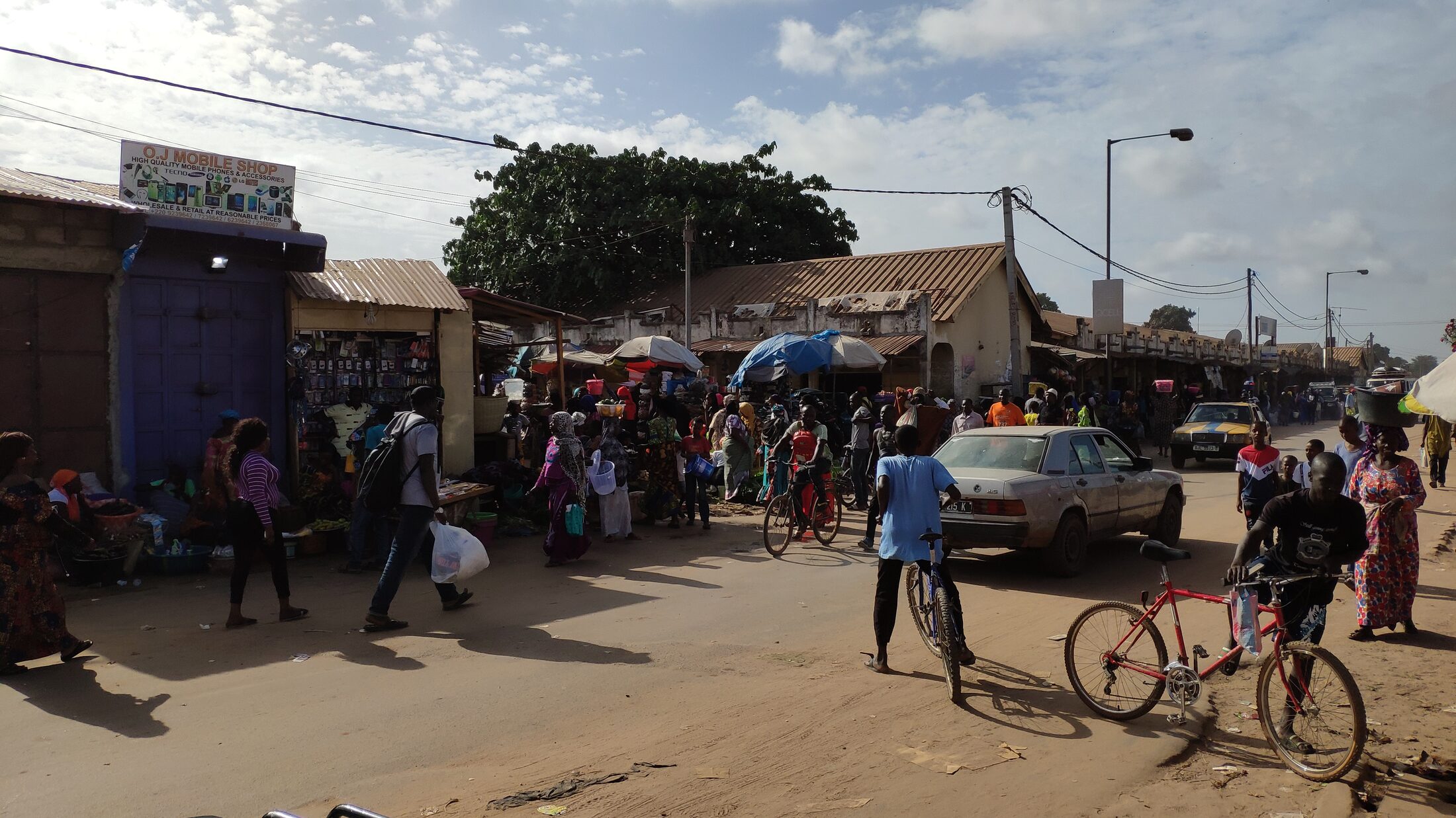 Street scene on Nyambai Road in Brikama, The Gambia.